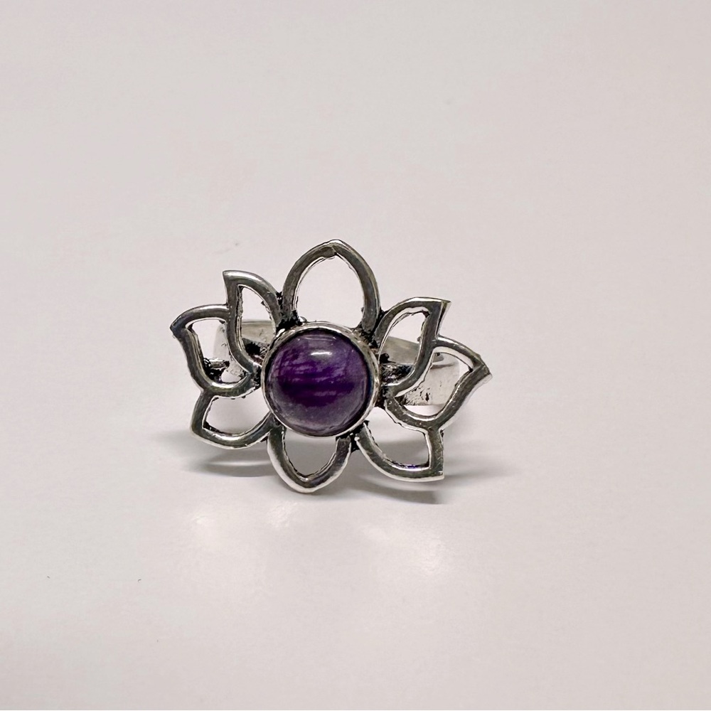 Silver metal Locus Flower Ring with authentic amethyst stone.